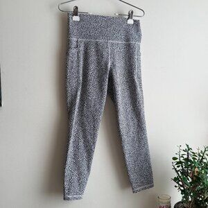 Athleta Salutation Stash II Textured Tight in Tiny Cheetah print - Women’s M